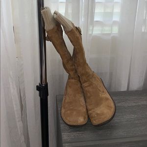 Light brown boots.